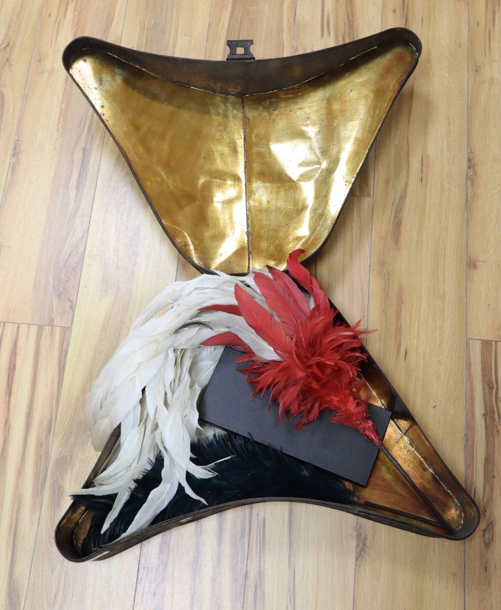 A tri-corn hat tin with plumes